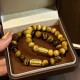 无氢小号招财金管-8mm虎眼石手串 