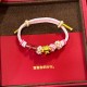 无氢玉桂狗+草莓晶编绳 